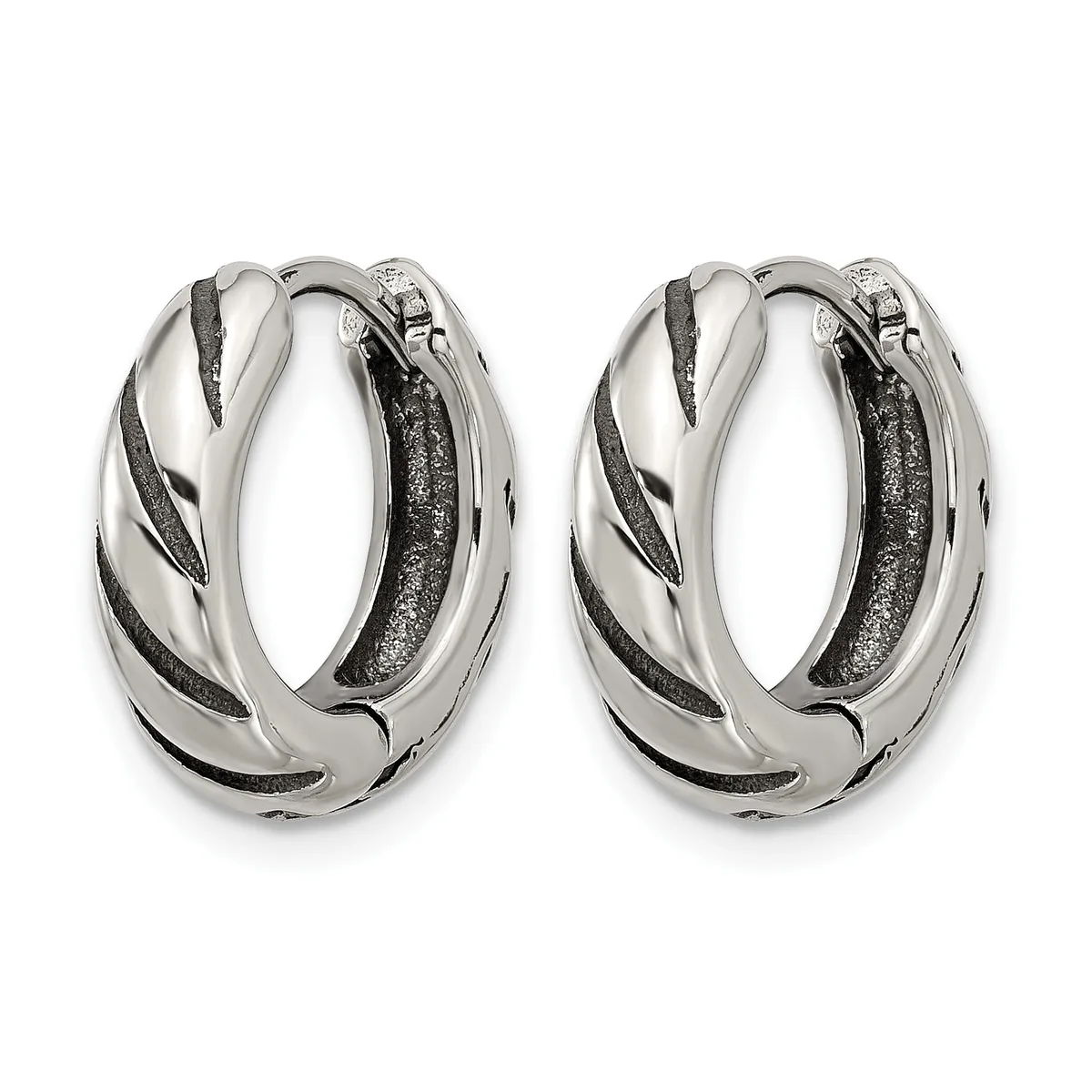 A pair of silver hoop earrings with twisted diagonal black striping and textured surfaces, shown from the front.