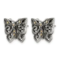 A pair of ornate butterfly stud earrings with detailed scrollwork patterns in silver-tone metal accented with gold-tone gemstones or beads throughout the wings and body.