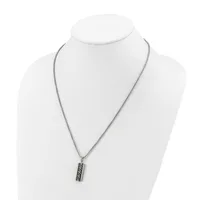 A silver-toned chain necklace with a rectangular pendant featuring a geometric crosshatch pattern, displayed on a white mannequin bust.