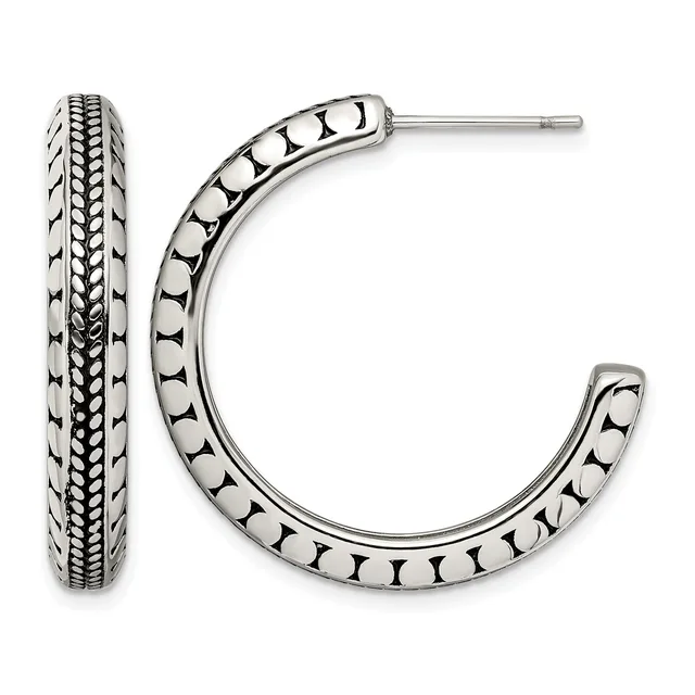 A pair of sterling silver hoop earrings with textured bead detailing along the curved surface, shown from front and side views.
