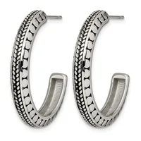 Pair of silver hoop earrings with textured braided and geometric linear patterns, shown from the front on posts.
