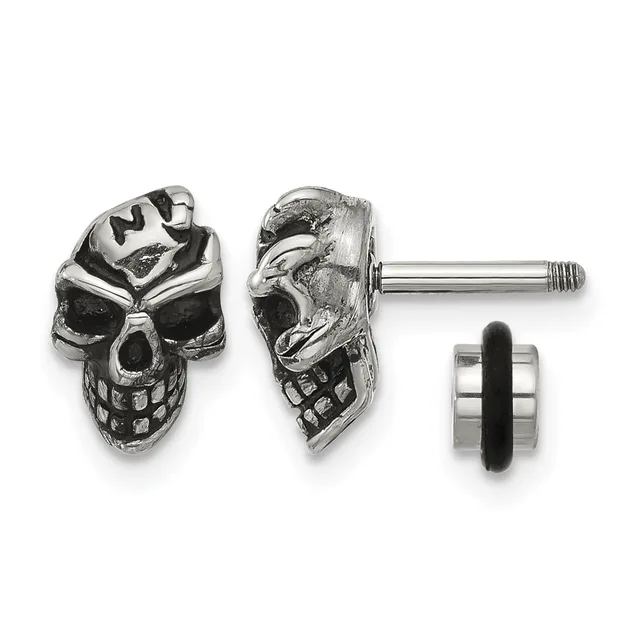 Pair of silver skull stud earrings shown from front and side views with a rubber backing post displayed separately.
