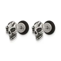 A pair of silver skull cufflinks with black onyx eyes and a black leather backing on the post, shown from the front.