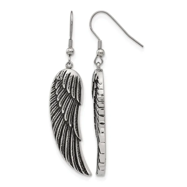 A pair of silver-toned dangle earrings with fish hook wires, one featuring an embossed feather design and the other showing a ridged cylindrical shape, displayed side by side.