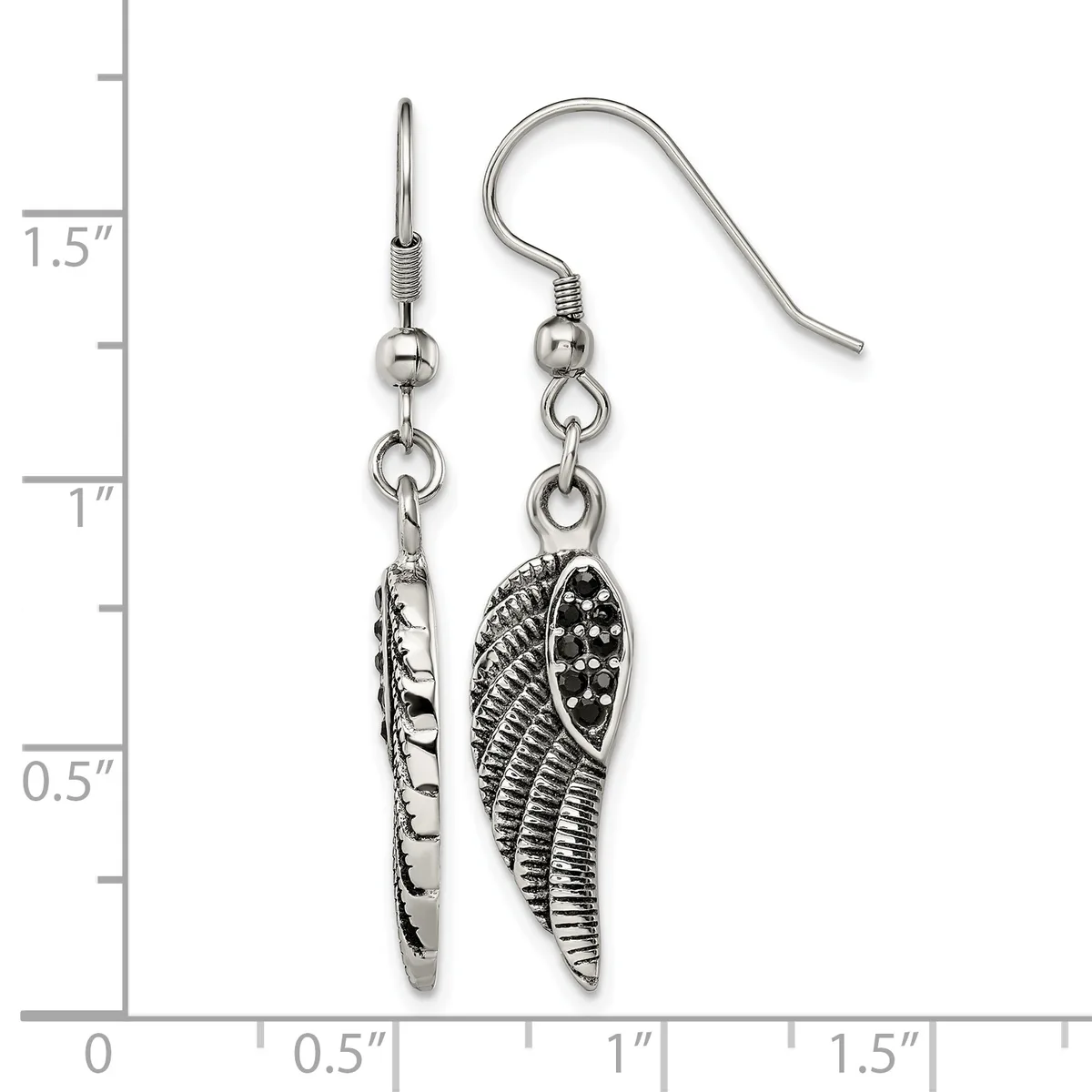 A pair of silver-toned dangle earrings featuring textured wing charms suspended from fish hook wires, displayed against a measurement scale showing approximately 1.5 inches in length.