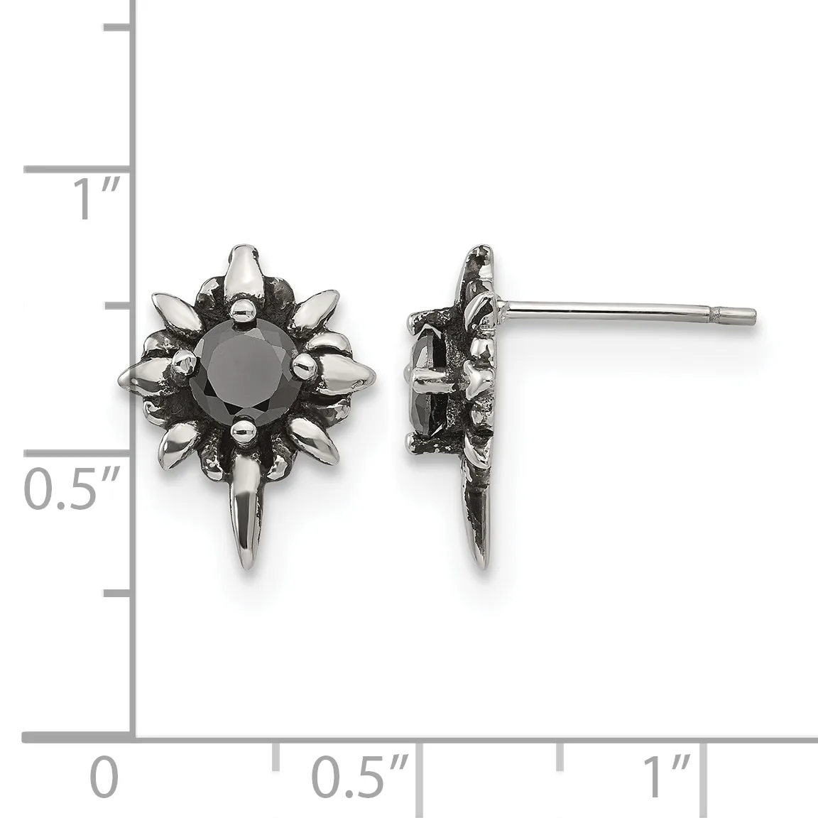 Pair of ornate silver-toned stud earrings with dark round stones surrounded by decorative spikes, displayed against a measurement ruler showing approximately 0.5 inches in height.