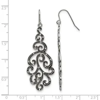 Pair of ornate silver-tone filigree earrings with scrollwork design and small crystal accents, shown front and back views against a ruler measuring approximately two inches in length.
