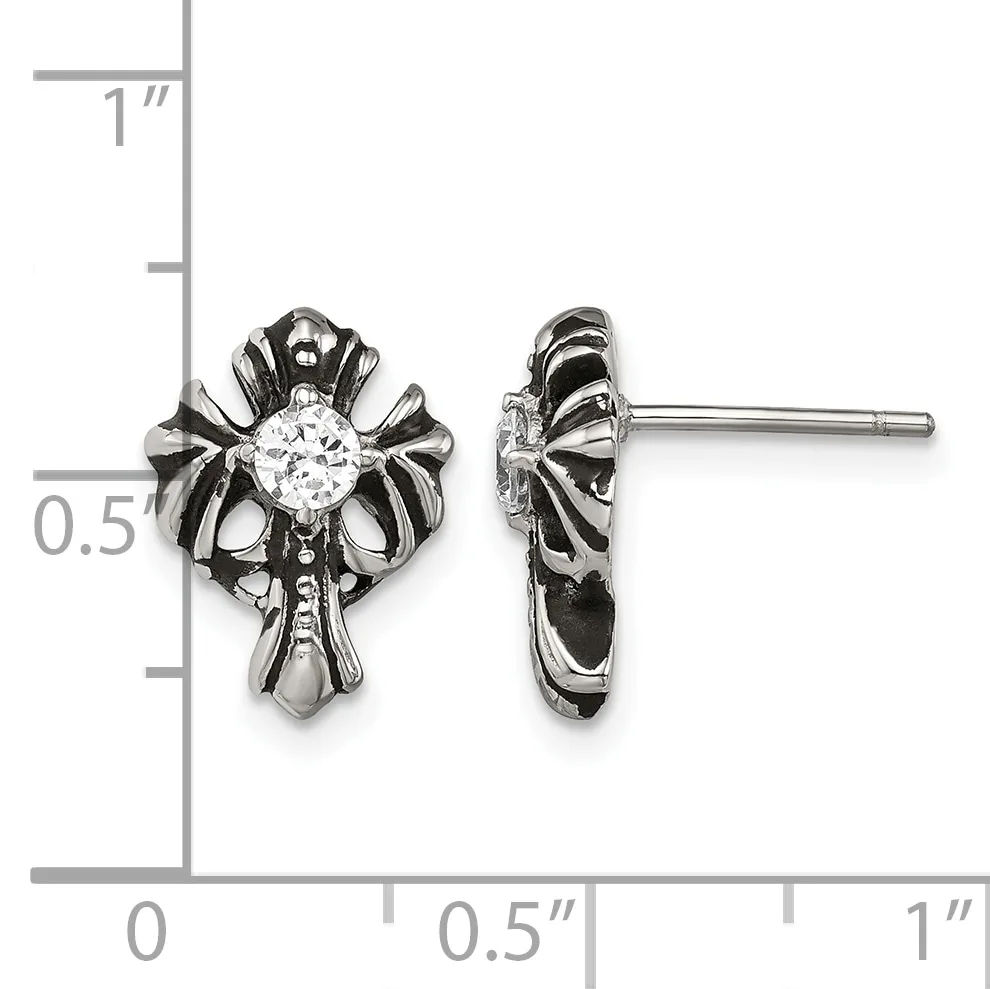 Pair of ornate silver stud earrings with cross-shaped designs featuring round clear gemstones in the center, shown front and side view against a ruler measuring approximately half an inch tall.