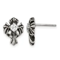 Pair of stainless steel cross-shaped stud earrings with ornate wings and a round clear crystal stone in the center, shown from front and side views.