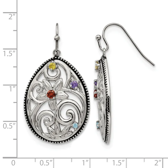 Ornate silver teardrop earrings with scrollwork filigree design and colorful gemstones, shown front and back view against a measurement ruler.
