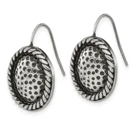 A pair of silver earrings with oval frames featuring twisted rope borders around dotted centers, suspended from curved ear wires.