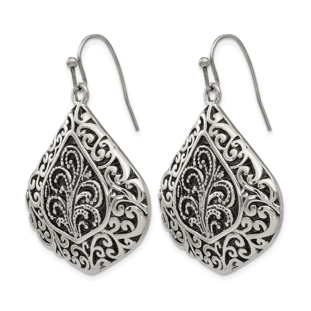 Pair of silver teardrop earrings with ornate filigree scrollwork design and fish hook wires.