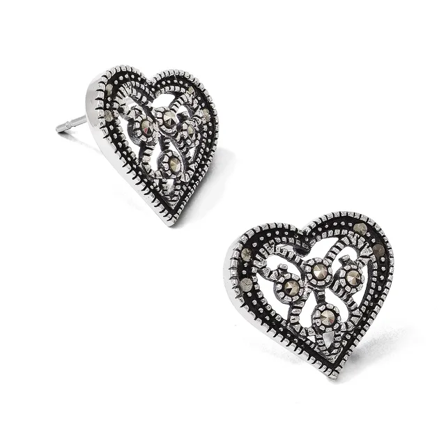 Pair of silver heart-shaped stud earrings with ornate filigree and beaded detailing throughout the design.