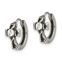 A pair of silver hoop earrings with diamond solitaires set in decorative metalwork, shown from the front against a white background.