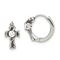 Silver cross earrings with cubic zirconia centers, shown as a detached cross pendant and a matching hoop earring with hinged closure.