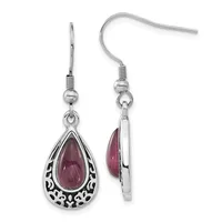 Pair of silver teardrop earrings with pink tourmaline stones set in decorative filigree bezels, shown from front and side views.