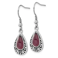 A pair of silver teardrop earrings with purple gemstones and ornate filigree detailing, suspended from silver ear wires.