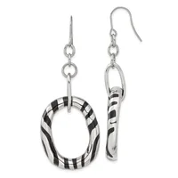 A pair of silver dangle earrings with black and white striped resin rings, one oval-shaped and one curved tube-shaped, suspended from silver hooks.
