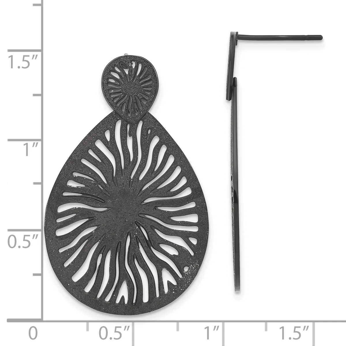 Black metal teardrop earring with radiating line cutout design and matching circular post, shown next to ruler displaying approximately 1.5 inches in length.