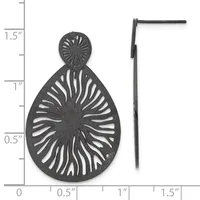 Black metal teardrop earring with radiating line cutout design and matching circular post, shown next to ruler displaying approximately 1.5 inches in length.
