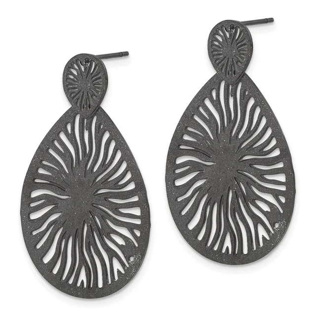 A pair of dark gray metal teardrop earrings with radiating line cutout designs and small circular post tops, displayed side by side.
