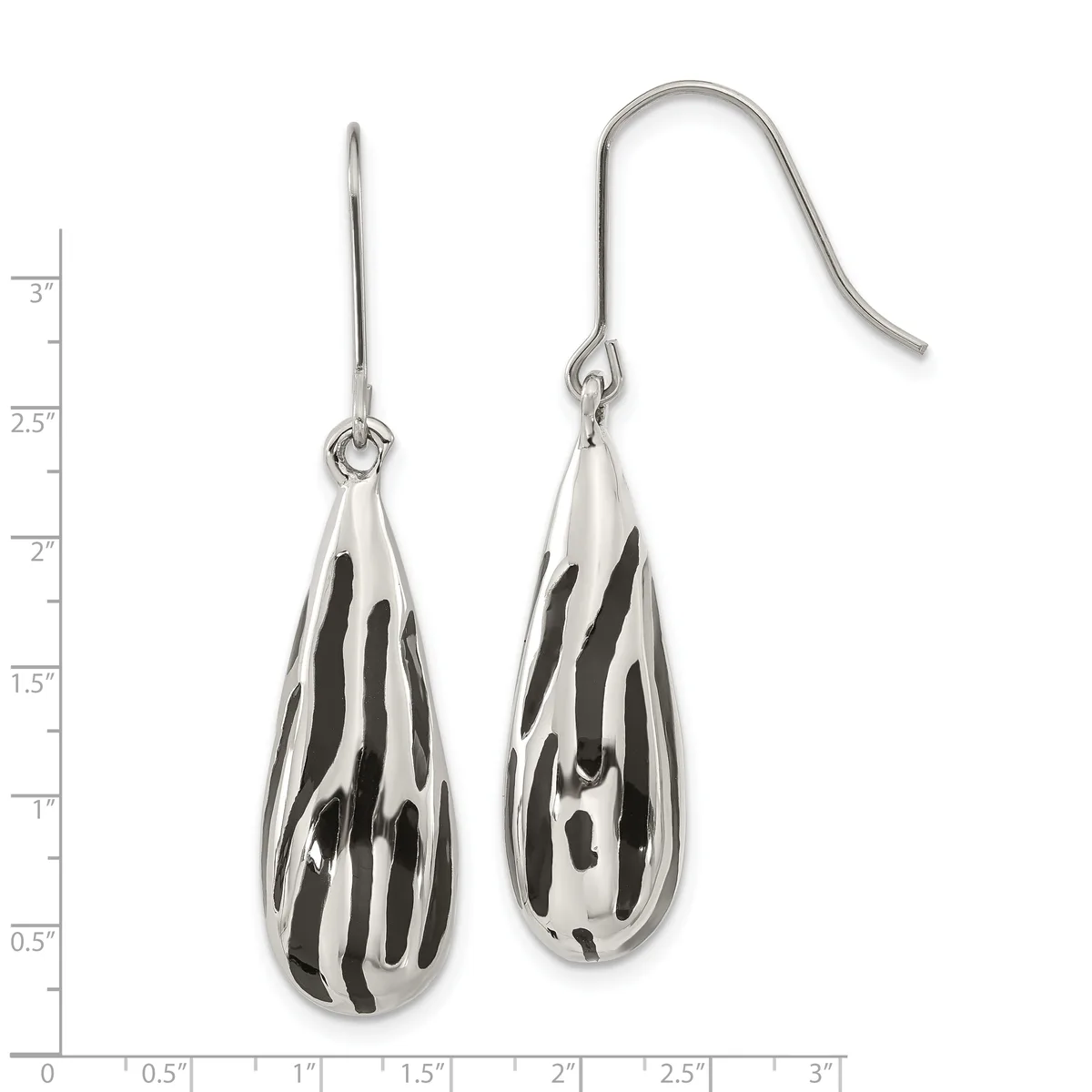 Pair of silver teardrop earrings with black enamel zebra stripe pattern, shown on a measurement scale.