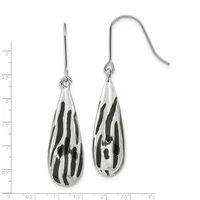 Pair of silver teardrop earrings with black enamel zebra stripe pattern, shown on a measurement scale.