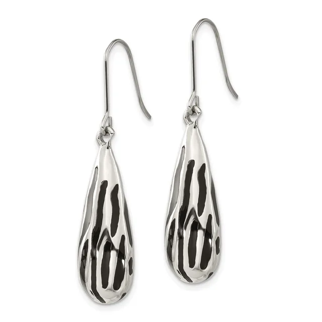 A pair of silver teardrop earrings with black striped pattern details, suspended from curved wire hooks.