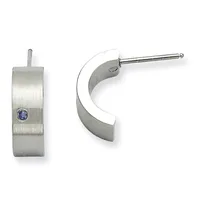 A pair of stainless steel hoop earrings with a brushed finish and small blue stone accent, shown from front and side views.