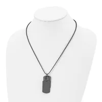 A gunmetal-colored beaded chain necklace with a rectangular dog tag pendant displayed on a white mannequin bust.