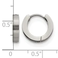 A pair of polished stainless steel chunky hoop earrings shown next to a ruler indicating they are approximately 0.5 inches in diameter and width.