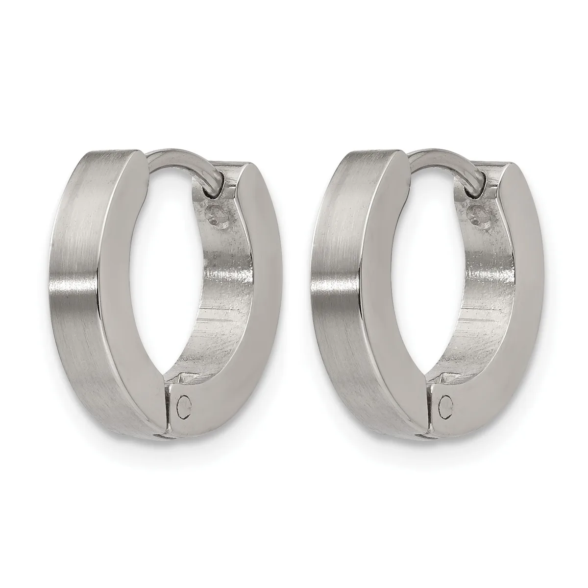 Pair of polished silver-toned stainless steel huggie hoop earrings with a brushed finish and small hallmarks on the clasps.