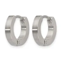 Pair of polished silver-toned stainless steel huggie hoop earrings with a brushed finish and small hallmarks on the clasps.