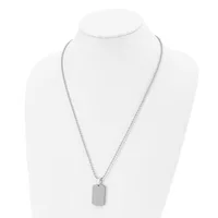 A silver-toned rectangular pendant hangs from a delicate chain on a white mannequin bust.