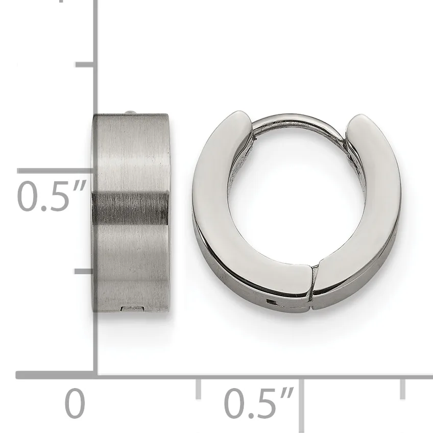 A pair of chunky stainless steel huggie hoop earrings shown from front and side views with measurement scale indicating 0.5 inch width.