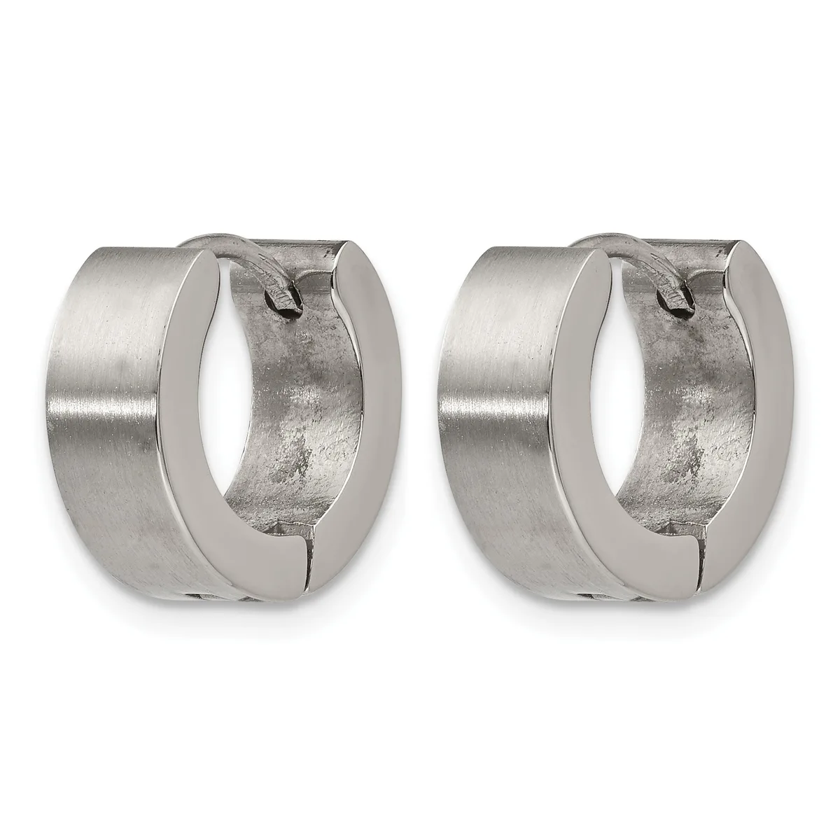A pair of polished silver-toned chunky huggie hoop earrings with a brushed finish on the interior, shown from the front.