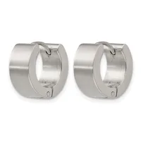 A pair of polished silver huggie hoop earrings with a brushed finish and hinged closure posts, shown from the front.