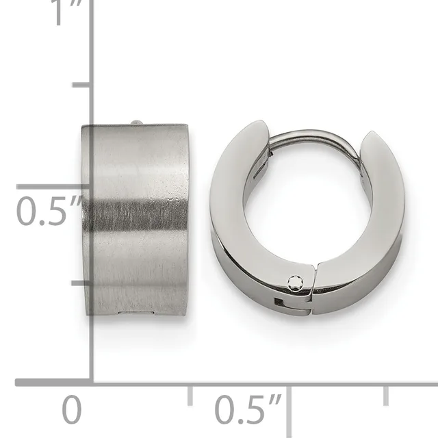 Two stainless steel hoop earrings displayed against a measurement scale showing approximately 0.5 inches in width, one shown from the side and one from the front.