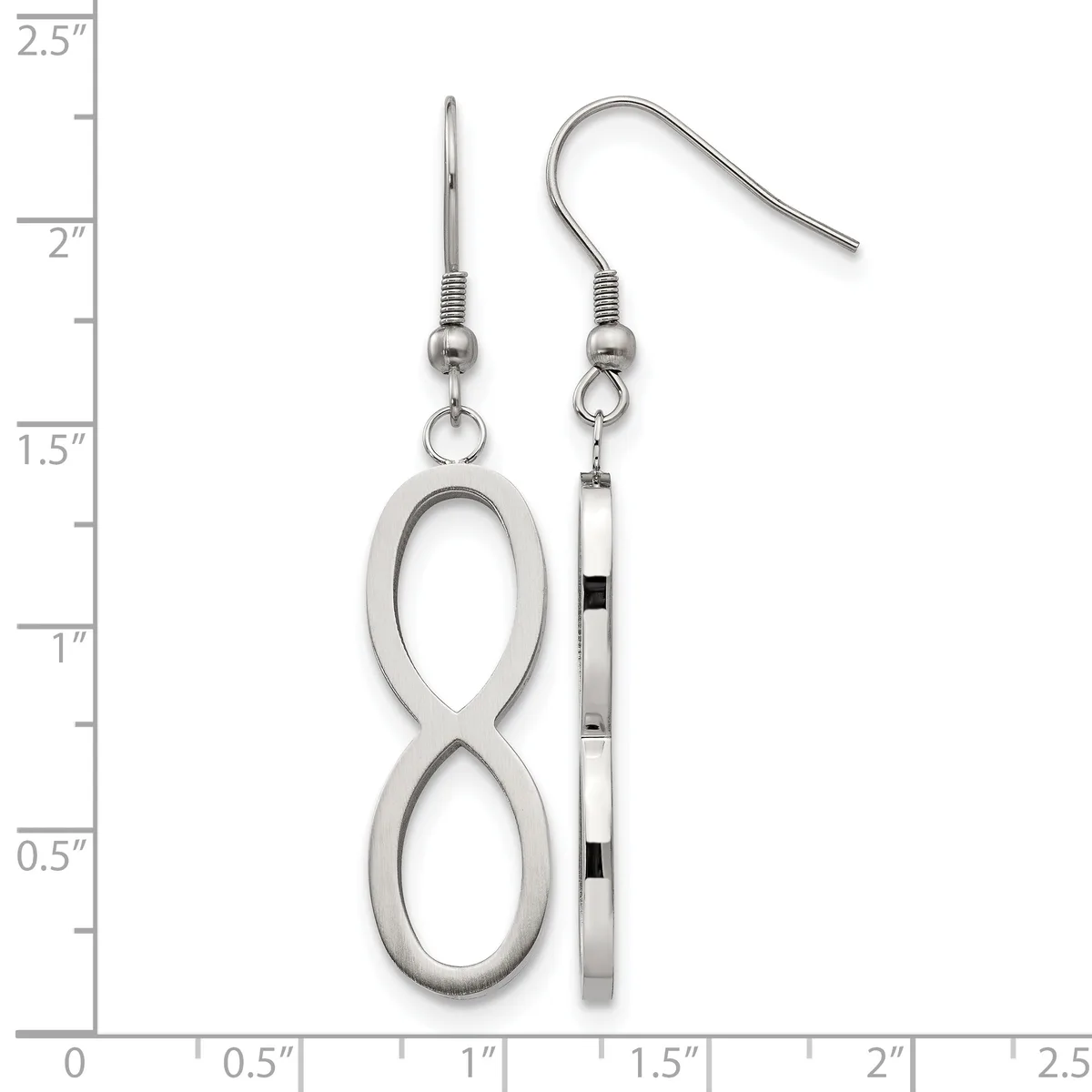 Two silver-toned dangle earrings displayed against a ruler: one featuring an infinity symbol, the other a rectangular bar with black accents, both with wire hooks.