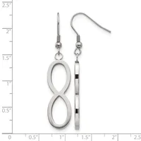 Two silver-toned dangle earrings displayed against a ruler: one featuring an infinity symbol, the other a rectangular bar with black accents, both with wire hooks.