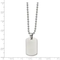 A stainless steel dog tag pendant hangs from a ball chain necklace, displayed against a measurement scale showing the pendant is approximately one inch wide and one and a half inches tall.