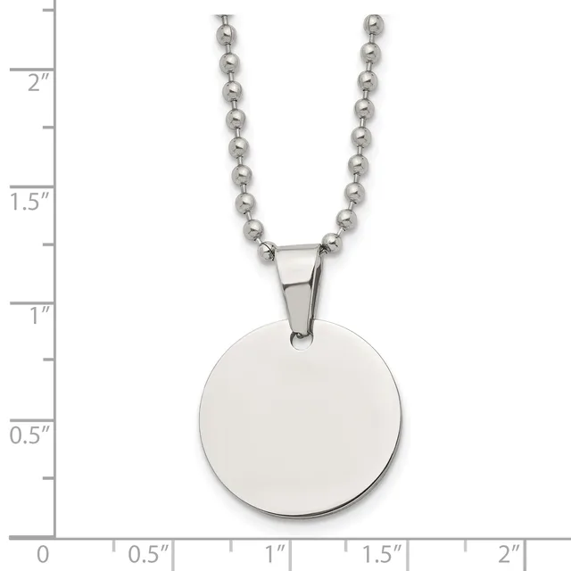 Silver-toned ball chain necklace with a polished circular pendant, displayed against a measurement scale showing the pendant is approximately one inch in diameter.