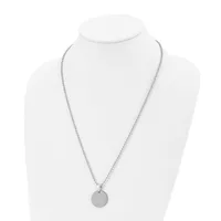 A silver-toned chain necklace with a small circular pendant displayed on a white bust form.