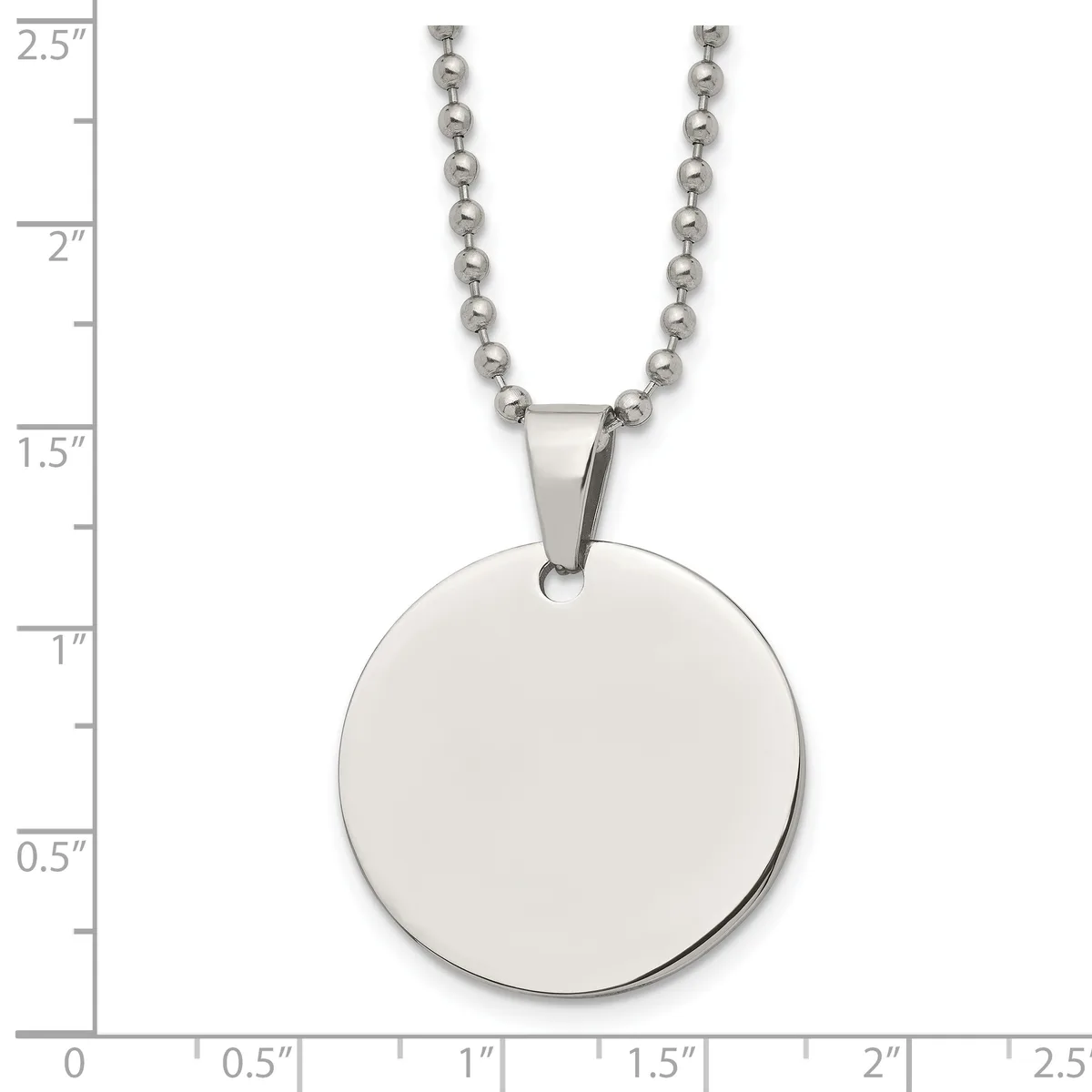 A silver ball chain necklace with a polished circular disc pendant, displayed against a ruler showing the pendant is approximately one inch in diameter.