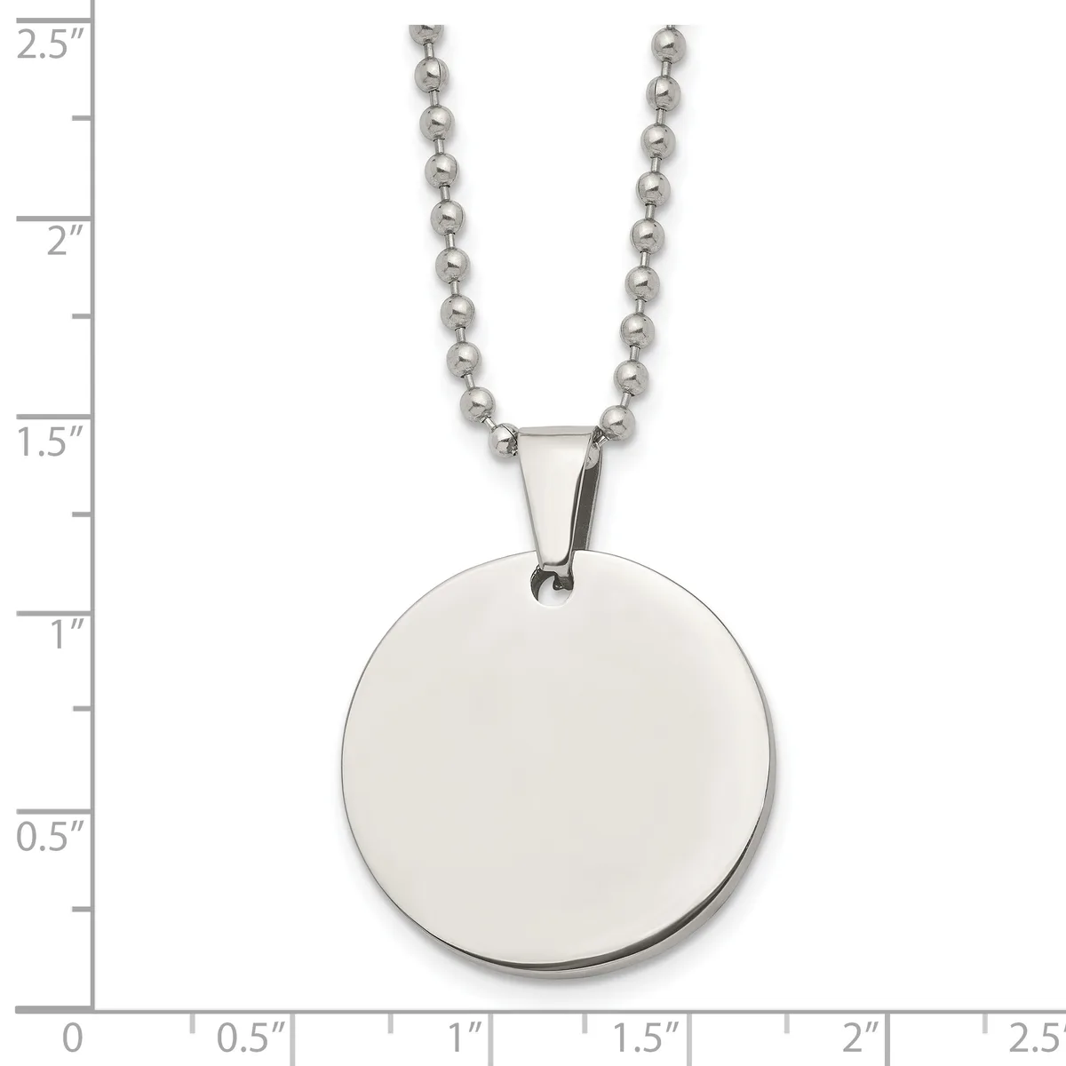 A stainless steel ball chain necklace with a polished circular pendant, displayed against a ruler showing the pendant is approximately one inch in diameter.