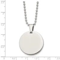 A stainless steel ball chain necklace with a polished circular pendant, displayed against a ruler showing the pendant is approximately one inch in diameter.
