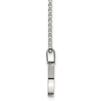 A silver cylindrical pendant hangs from a delicate chain, with an open carabiner loop at the top.
