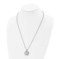 A silver-toned necklace with a thin chain and small circular pendant displayed on a white mannequin bust.