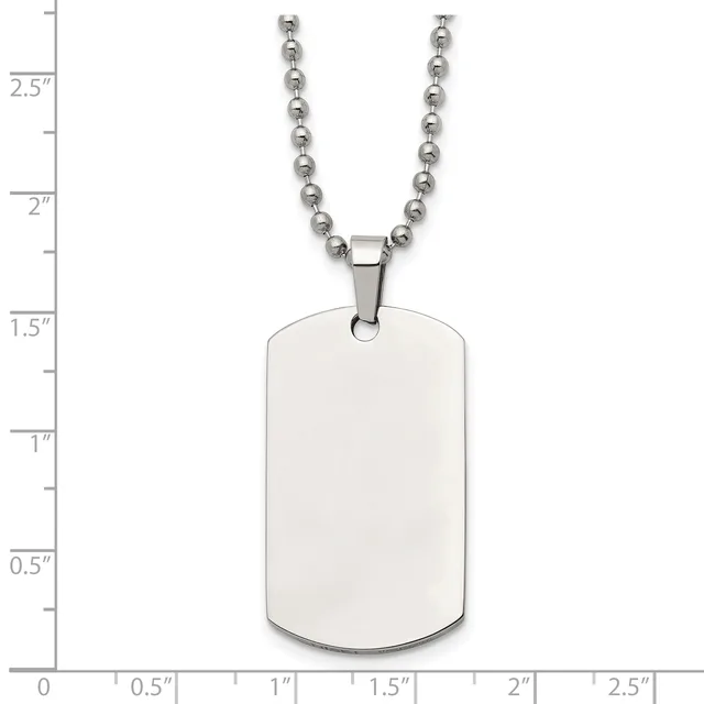 A stainless steel dog tag pendant with rounded corners hangs from a beaded chain, shown against a measurement scale indicating the tag is approximately 1.25 inches tall.