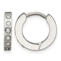 A pair of silver hoop earrings with a brushed finish and five round cubic zirconia stones set along one flat rectangular earring, displayed open.
